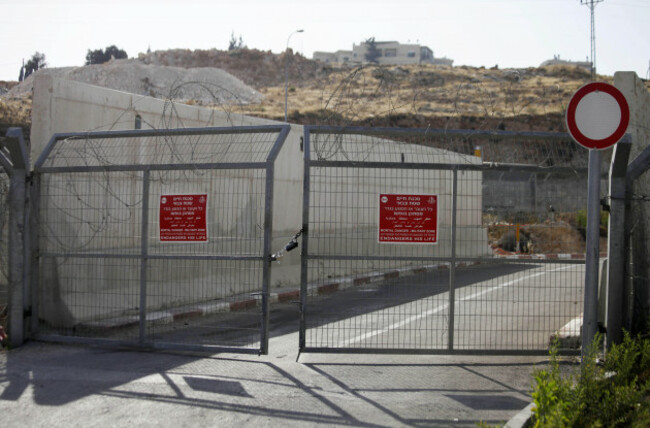 jerusalem-west-bank-palestinian-territory-9th-july-2013-a-picture-shows-a-closed-gate-between-jerusalem-and-anata-neighborhood-near-jerusalem-on-july-9-2013-the-israeli-coordinator-of-governmen