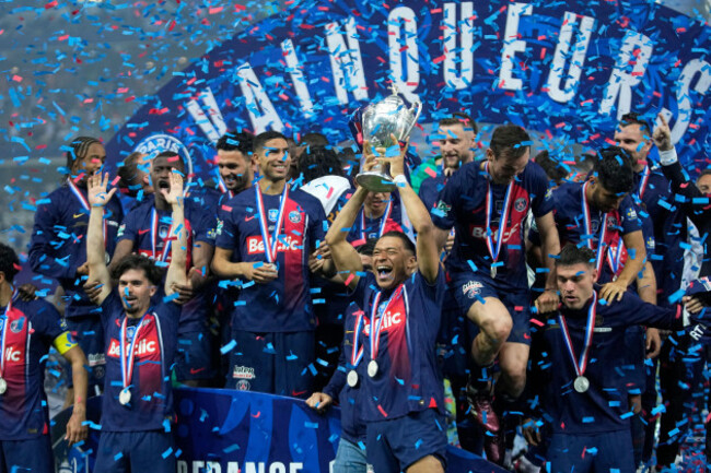 psgs-kylian-mbappe-raises-the-trophy-during-the-presentation-ceremony-after-the-french-cup-final-soccer-match-between-lyon-and-psg-at-the-pierre-mauroy-stadium-in-villeneuve-dascq-northern-france