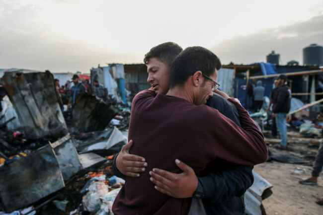 palestinians-react-next-to-the-destruction-after-an-israeli-strike-where-displaced-people-were-staying-in-rafah-gaza-strip-monday-may-27-2024-palestinian-health-workers-said-israeli-airstrikes-ki