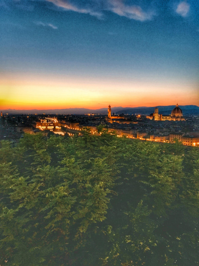 a-cityscape-view-of-florence-tuscany-italy-at-dusk-early-evening-showing-florence-cathedral-duomo-and-the-ponte-vecchio-illuminated