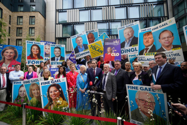 taoiseach-and-fine-gael-leader-simon-harris-centre-speaks-following-a-launch-event-for-his-partys-european-and-local-election-manifestos-in-dublin-picture-date-monday-may-27-2024