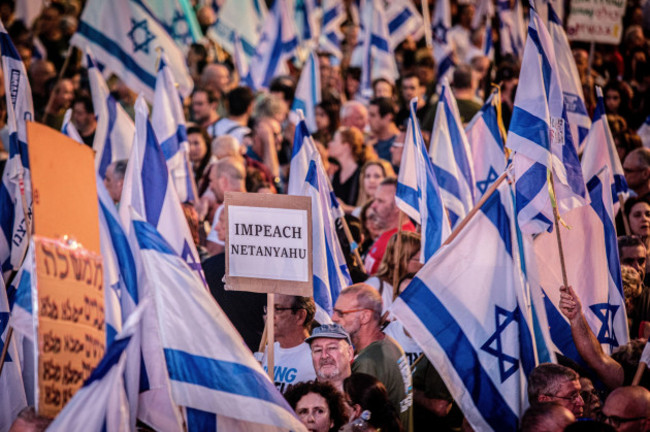 tel-aviv-israel-18th-may-2024-a-protestor-holds-a-placard-saying-impeach-netanyahu-during-the-demonstration-israeli-war-cabinet-minister-benny-gantz-has-threatened-to-resign-unless-prime-minist