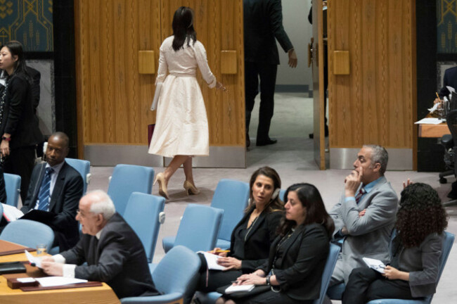 u-s-ambassador-to-the-united-nations-nikki-haley-top-center-leaves-the-room-as-palestinian-ambassador-to-the-united-nations-riyad-mansour-right-prepares-to-address-a-security-council-meeting-on-t