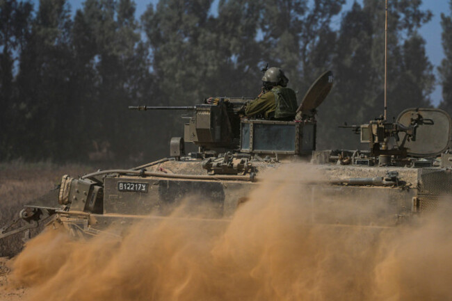 israeli-soldiers-drive-an-apc-near-the-israeli-gaza-border-in-southern-israel-thursday-may-30-2024-ap-phototsafrir-abayov