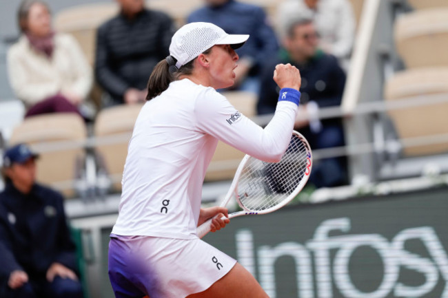 polands-iga-swiatek-clenches-her-fist-after-scoring-a-point-against-russias-anastasia-potapova-during-their-fourth-round-match-of-the-french-open-tennis-tournament-at-the-roland-garros-stadium-in-pa