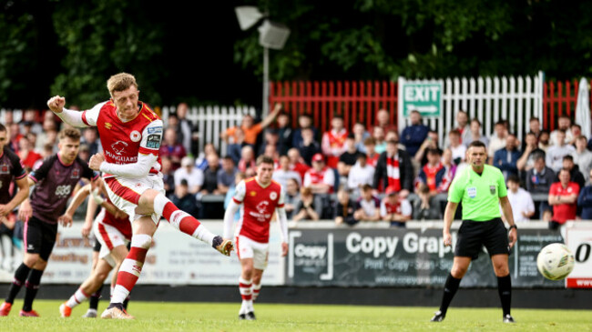 chris-forrester-scores-a-penalty