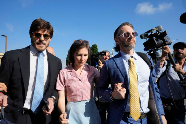 amanda-knox-arrives-flanked-by-her-husband-christopher-robinson-right-and-her-layer-luca-luparia-donati-at-the-florence-courtroom-in-florence-italy-wednesday-june-5-2024-amanda-knox-returns-to