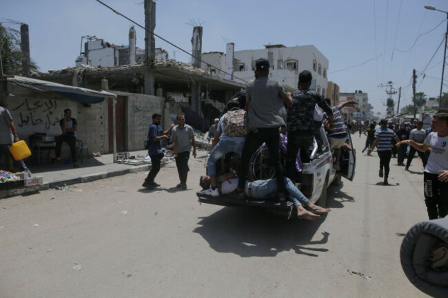 palestinians-evacuate-dead-and-wounded-in-the-israeli-bombardment-of-the-gaza-strip-in-deir-al-balah-on-saturday-june-8-2024-ap-photojehad-alshrafi