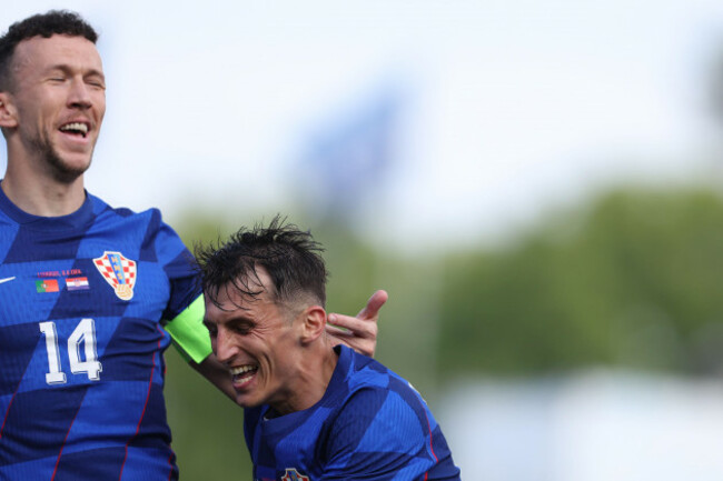 lisbon-portugal-08th-june-2024-lisbon-portugal-june-8-ante-budimir-of-croatia-celebrate-after-scoring-with-ivan-perisic-of-croatia-during-international-friendly-match-between-portugal-and-croa