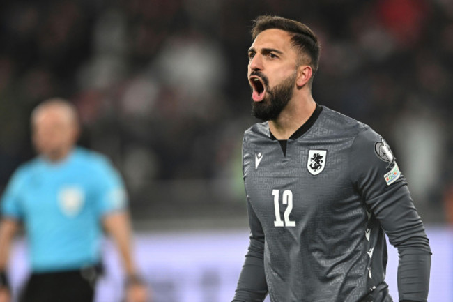 file-georgia-goalkeeper-giorgi-mamardashvili-reacts-after-his-save-during-a-penalty-shootout-at-the-end-of-the-euro-2024-qualifying-play-off-soccer-match-between-georgia-and-greece-at-the-boris-paic