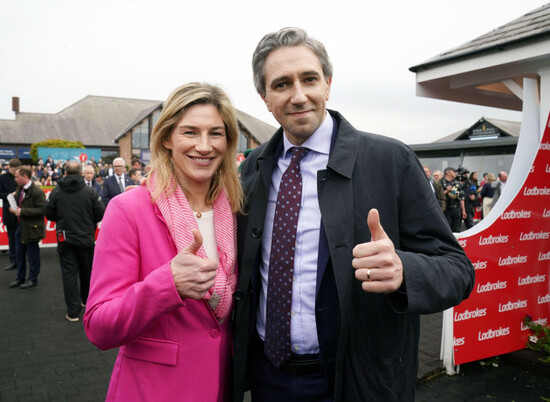 former-jockey-and-fine-gael-candidate-for-the-midlandsnorth-west-constituency-at-the-2024-european-parliament-elections-nina-carberry-with-taoiseach-simon-harris-on-day-three-of-the-punchestown-festi