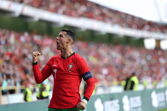 portugals-cristiano-ronaldo-celebrates-after-scoring-against-ireland-during-a-friendly-soccer-match-between-portugal-and-ireland-at-the-aveiro-municipal-stadium-in-aveiro-portugal-tuesday-june-11