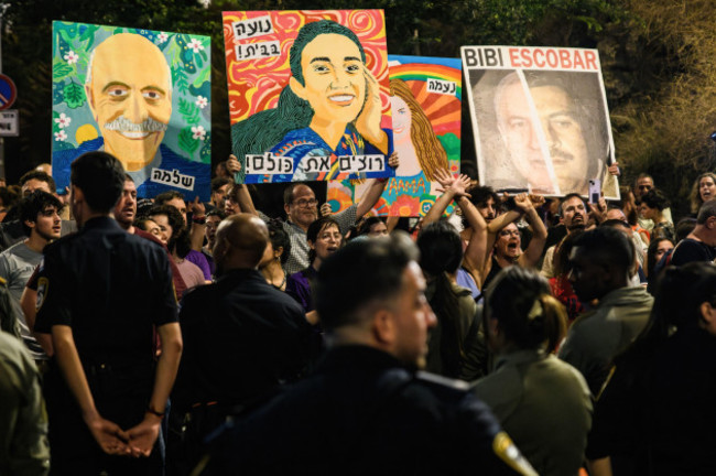 tel-aviv-israel-08th-june-2024-protestors-line-up-in-front-of-israeli-police-while-chanting-and-holding-paintings-of-the-israeli-hostages-among-them-rescued-hostage-noa-argamani-whose-sign-says