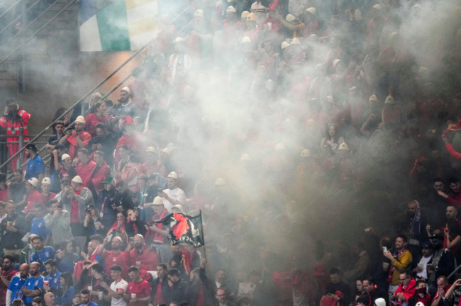 smoke-engulfs-albanian-fans-after-albanias-nedim-bajrami-scored-his-sides-opening-goal-during-a-group-b-match-between-italy-and-albania-at-the-euro-2024-soccer-tournament-in-dortmund-germany-satur