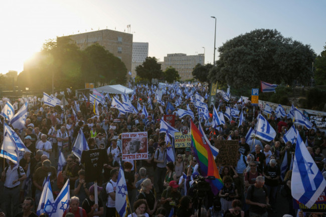 people-take-part-in-a-protest-against-israeli-prime-minister-benjamin-netanyahus-government-demanding-new-elections-and-the-release-of-the-hostages-held-in-the-gaza-strip-outside-of-the-knesset-is