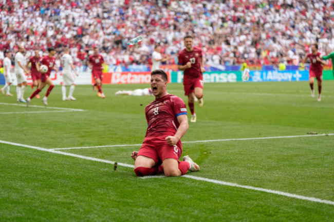 serbias-luka-jovic-celebrates-after-scoring-his-side-first-goal-during-a-group-c-match-between-slovenia-and-serbia-at-the-euro-2024-soccer-tournament-in-munich-germany-thursday-june-20-2024-ap