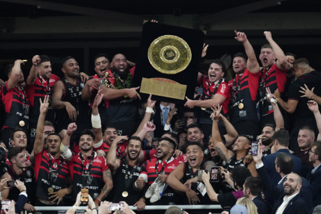 charlie-faumuina-and-antoine-dupont-lift-the-bouclier-de-brennus-trophy-after-their-side-wins-the-final