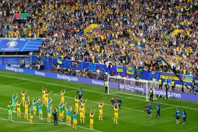 ukraine-players-greet-fans-after-a-2-1-win-over-slovakia-in-a-group-e-match-between-slovakia-and-ukraine-at-the-euro-2024-soccer-tournament-in-duesseldorf-germany-friday-june-21-2024-ap-photoal