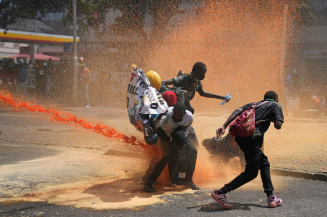 protesters-scatter-as-kenya-police-spray-water-canon-at-them-during-a-protest-over-proposed-tax-hikes-in-a-finance-bill-in-downtown-nairobi-kenya-tuesday-june-25-2024-ap-photobrian-inganga