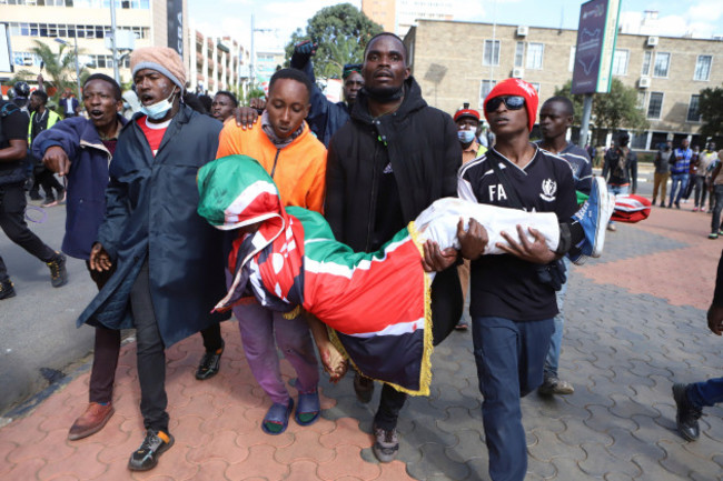 protesters-carry-the-body-of-a-man-who-was-shot-during-a-protest-over-proposed-tax-hikes-in-a-finance-bill-in-downtown-nairobi-kenya-tuesday-june-25-2024-ap-photoandrew-kasuku