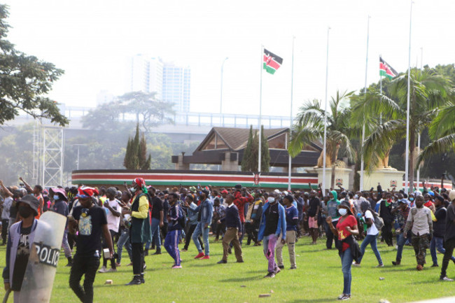 protesters-walk-on-the-grounds-of-the-kenyan-parliament-during-a-protest-over-proposed-tax-hikes-in-a-finance-bill-in-downtown-nairobi-kenya-tuesday-june-25-2024-ap-photoandrew-kasuku