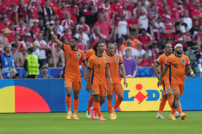 cody-gakpo-of-the-netherlands-left-celebrates-his-goal-against-austria-during-a-group-d-match-at-the-euro-2024-soccer-tournament-in-berlin-germany-tuesday-june-25-2024-ap-photosunday-alamba