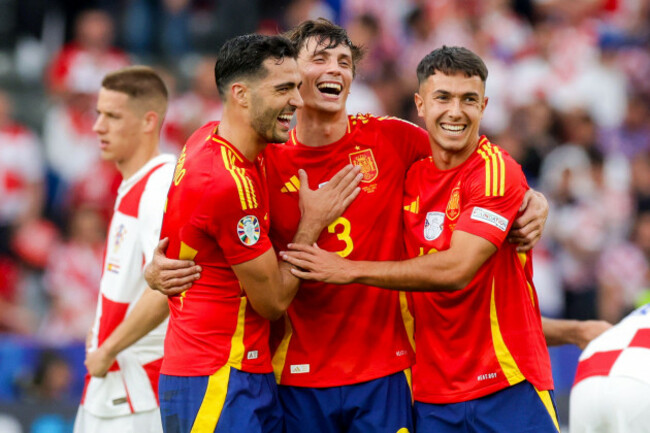 berlin-germany-15th-june-2024-mikel-merino-robin-le-normand-and-martin-zubimendi-of-spain-celebrate-the-win-during-the-uefa-euro-2024-group-stage-match-between-spain-and-croatia-at-olympiastadion