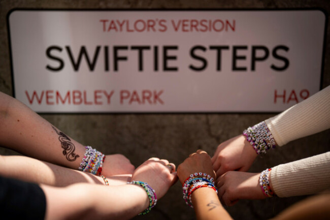 taylor-swift-fans-pose-with-their-friendship-bracelets-in-front-of-the-swiftie-steps-commissioned-by-london-mayor-sadiq-khan-before-the-first-london-concert-of-the-eras-tour-on-friday-june-21-2024