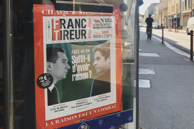 paris-france-june-25-2024-magazine-banner-of-franc-tireurin-with-jordan-bardella-and-attal-in-a-kiosk-with-newspapers-and-magazines