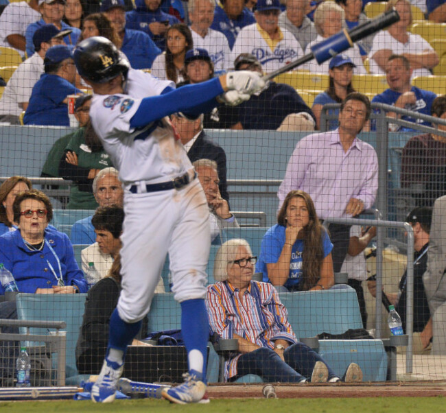 dr-neal-s-elattrache-pink-shirt-looks-on-from-the-owners-box-as-los-angeles-dodgers-2nd-baseman-and-outfielder-kike-hernandez-warms-up-to-bat-in-the-eighth-inning-of-game-one-of-the-national-leag