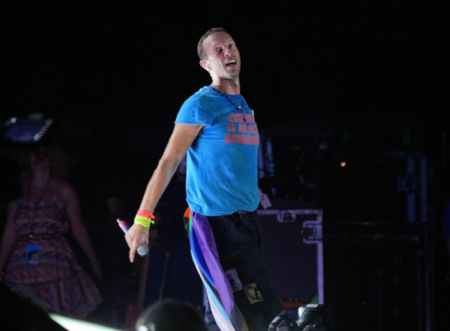 chris-martin-of-coldplay-performing-on-the-pyramid-stage-at-the-glastonbury-festival-worthy-farm-in-somerset-picture-date-saturday-june-29-2024