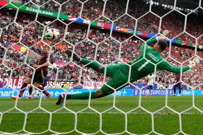 belgiums-jan-vertonghen-left-scores-an-own-goal-during-a-round-of-sixteen-match-between-france-and-belgium-at-the-euro-2024-soccer-tournament-in-duesseldorf-germany-monday-july-1-2024-ap-phot