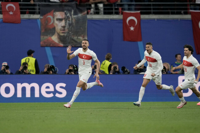 turkeys-merih-demiral-left-celebrates-scoring-his-sides-opening-goal-against-austria-during-a-round-of-sixteen-match-at-the-euro-2024-soccer-tournament-in-leipzig-germany-tuesday-july-2-2024