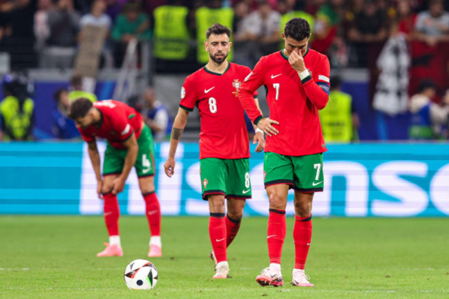 frankfurt-germany-01st-july-2024-frankfurt-germany-july-1-cristiano-ronaldo-of-portugal-looks-dejected-after-missed-penalty-bruno-fernandes-of-portugal-during-the-round-of-16-uefa-euro-2024