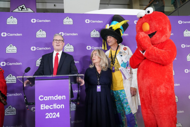 labour-leader-sir-keir-starmer-left-gives-a-victory-speech-watched-by-nick-the-incredible-flying-brick-second-right-and-bobby-elmo-smith-right-at-the-headquarters-of-camden-council-at-5-pancra