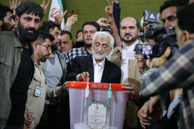 qarchak-tehran-iran-5th-july-2024-iranian-presidential-candidate-and-ultraconservative-former-top-nuclear-negotiator-saeed-jalili-c-casts-his-ballot-for-the-presidential-runoff-election-at-qa