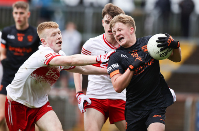 aodhan-mcgrane-is-tackled-by-cathair-mcbride