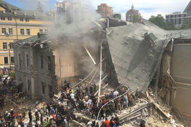 rescuers-and-volunteers-clean-up-the-rubble-and-search-victims-after-russian-missile-hit-the-countrys-main-children-hospital-okhmadit-in-kyiv-ukraine-monday-july-8-2024-the-daytime-barrage-targe