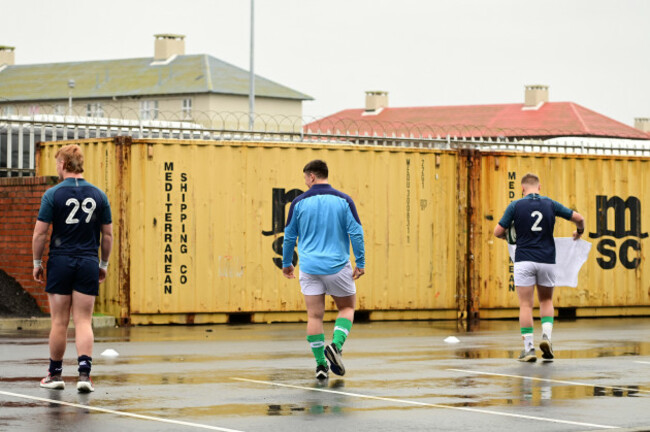 the-team-warm-up-in-the-car-park-due-to-the-weather