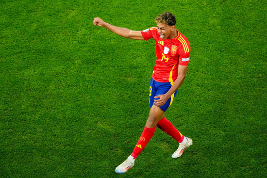 spains-lamine-yamal-celebrates-scoring-his-sides-first-goal-during-a-semifinal-match-between-spain-and-france-at-the-euro-2024-soccer-tournament-in-munich-germany-tuesday-july-9-2024-ap-photo