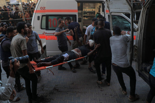 gaza-9th-july-2024-people-transfer-an-injured-man-after-an-israeli-bombing-in-the-southern-gaza-strip-city-of-khan-younis-on-july-9-2024-at-least-25-palestinians-were-killed-and-some-others-woun