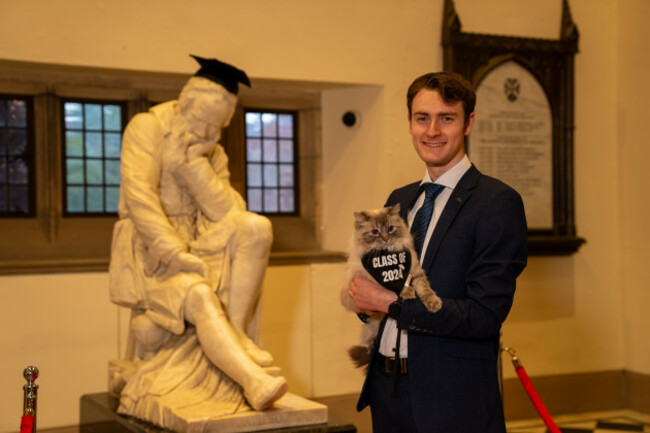 Raphael the cat with owner Aaron Christie
