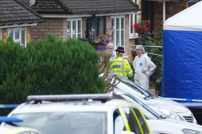police-and-forensic-officers-at-the-scene-in-ashlyn-close-bushey-hertfordshire-where-three-women-aged-25-28-and-61-who-police-believe-to-be-related-were-found-with-serious-injuries-and-died-at