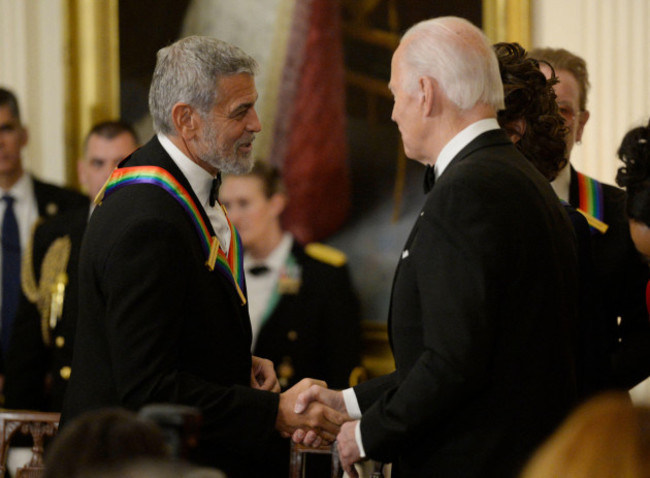 president-joe-biden-greets-george-clooney-at-a-reception-for-kennedy-center-honorees-in-the-east-room-of-the-white-house-in-washington-dc-on-sunday-december-4-2022-the-honorees-are-george-clooney