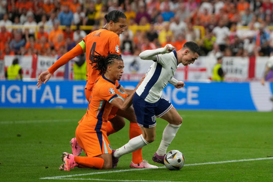 englands-phil-foden-right-nathan-ake-of-the-netherlands-left-and-virgil-van-dijk-fight-for-the-ball-during-a-semifinal-at-the-euro-2024-soccer-tournament-in-dortmund-germany-wednesday-july-10