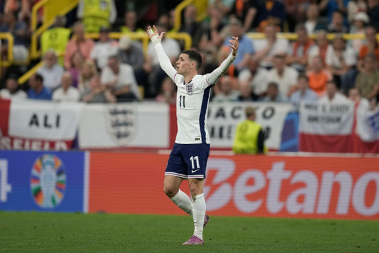 englands-phil-foden-gestures-during-a-semifinal-against-netherlands-at-the-euro-2024-soccer-tournament-in-dortmund-germany-wednesday-july-10-2024-ap-photothanassis-stavrakis