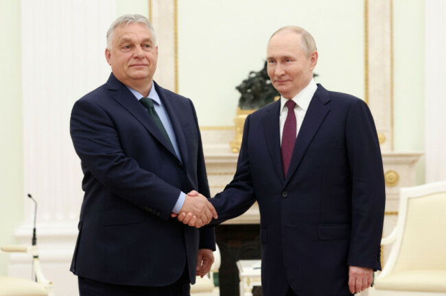 russian-president-vladimir-putin-right-and-hungarian-prime-minister-viktor-orban-shake-hands-during-a-meeting-in-moscow-russia-friday-july-5-2024-valeriy-sharifulin-sputnik-kremlin-pool-phot