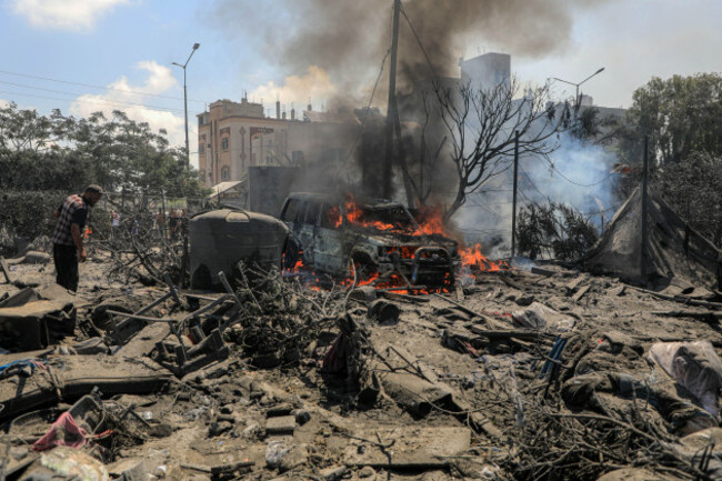 gaza-13th-july-2024-this-photo-taken-on-july-13-2024-shows-destroyed-buildings-and-vehicles-following-an-israeli-airstrike-in-the-mawasi-area-of-the-southern-gaza-strip-city-of-khan-younis-at-lea