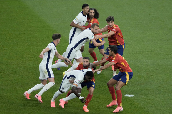 englands-players-left-and-spains-players-fight-for-the-position-during-the-final-match-at-the-euro-2024-soccer-tournament-in-berlin-germany-sunday-july-14-2024-ap-photothanassis-stavrakis