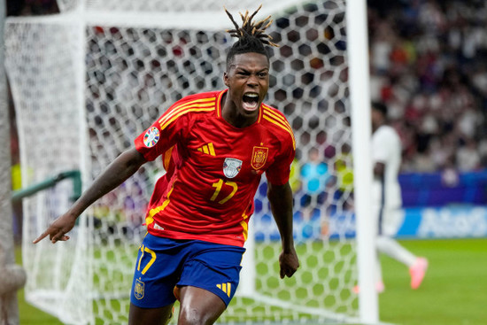 spains-nico-williams-celebrates-after-scoring-his-sides-opening-goal-during-the-final-match-between-spain-and-england-at-the-euro-2024-soccer-tournament-in-berlin-germany-sunday-july-14-2024-a